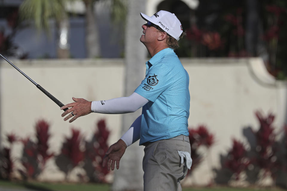 Charley Hoffman reacts to his putt on 16th green during the third round at the Sony Open golf tournament Saturday, Jan. 16, 2021, in Honolulu. (AP Photo/Marco Garcia)