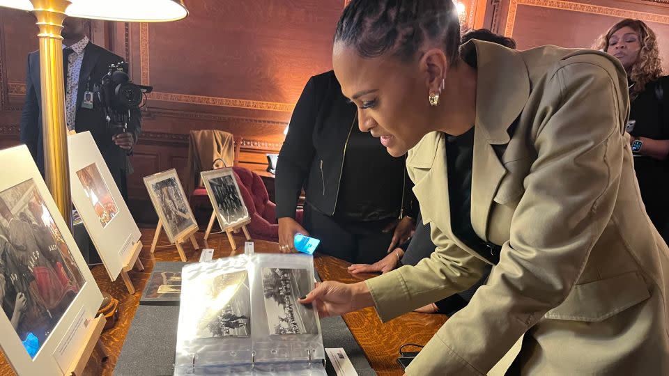 Ava DuVernay looks through a collection of historic relics and photos curated by the staff at the Library of Congress under the leadership of Dr. Carla Hayden, the first woman and first Black person to serve as Librarian of Congress. - Chandelis Duster/CNN