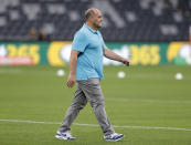 Argentina's head coach Mario Ledesma walks on the field prior to their Tri-Nations rugby union match against Australia in Sydney, Australia, Saturday, Dec. 5, 2020. (AP Photo/Rick Rycroft)