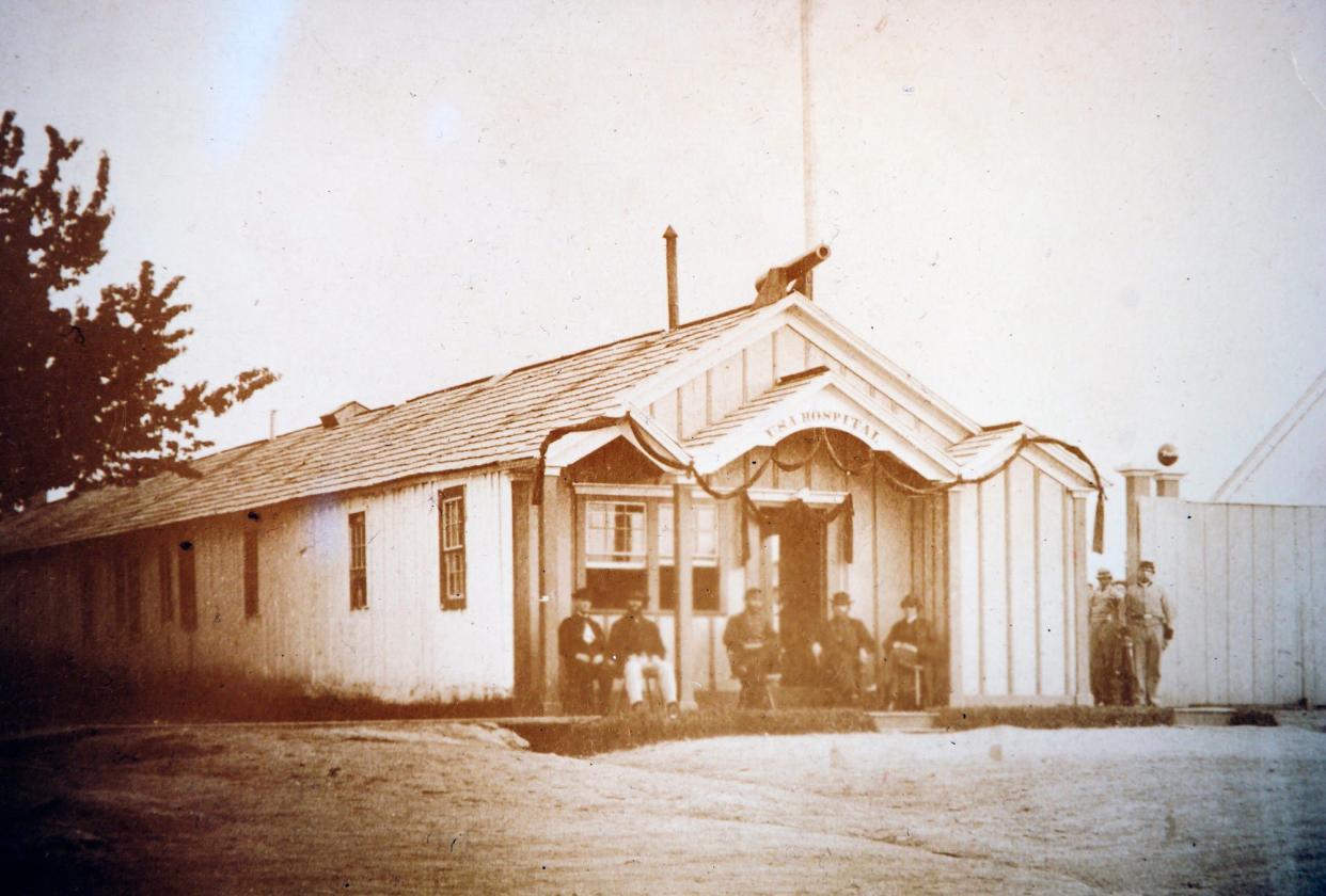 Black bunting likely commemorating Abraham Lincoln’s death can be seen on this building at the U.S. Army Hospital at Penn Park.