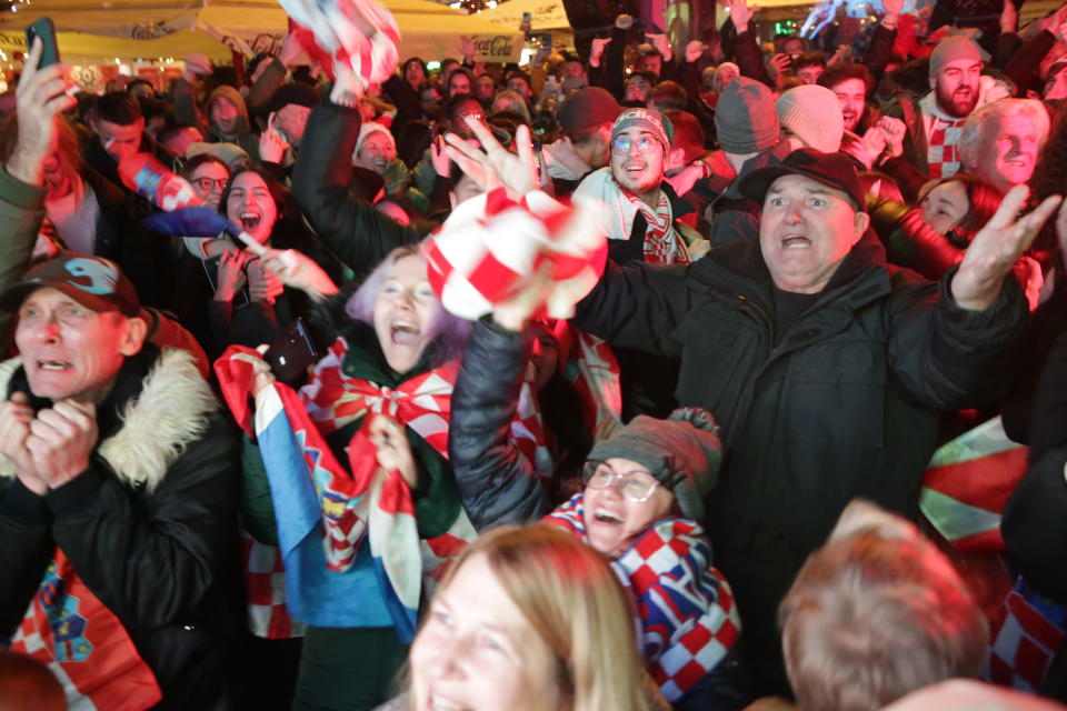 ZAGREB, CROATIA - DECEMBER 9: Croatian fans celebrate the victory of Croatian National Football team by defeating Brazil in the FIFA World Cup Qatar 2022 quarter final match in Zagreb, Croatia on 09 December 2022. (Photo by Stipe Majic/Anadolu Agency via Getty Images)