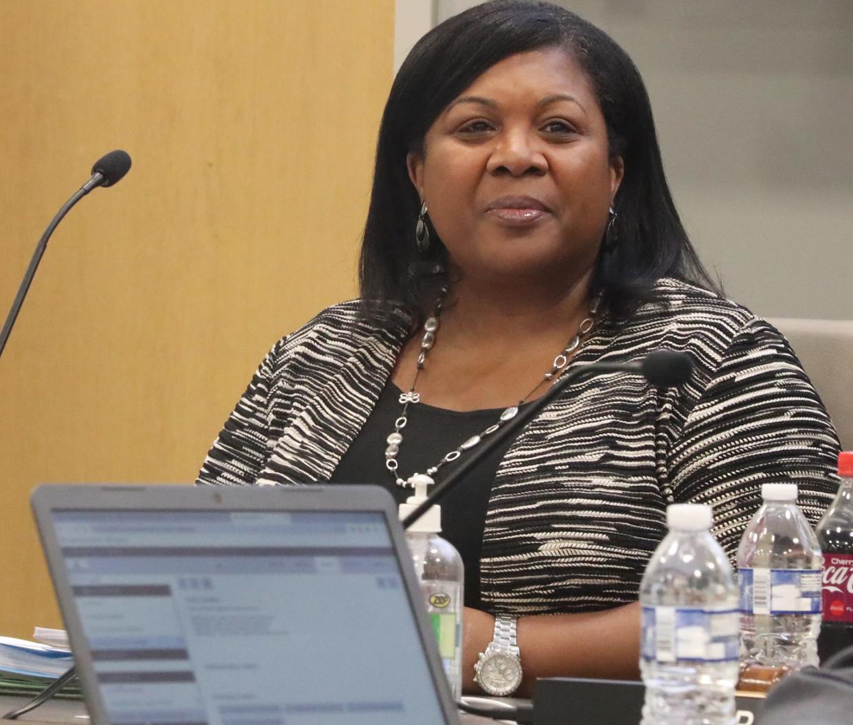 Akron Public Schools Superintendent Christine Fowler Mack listens before the start of a school board meeting on Monday in Akron.