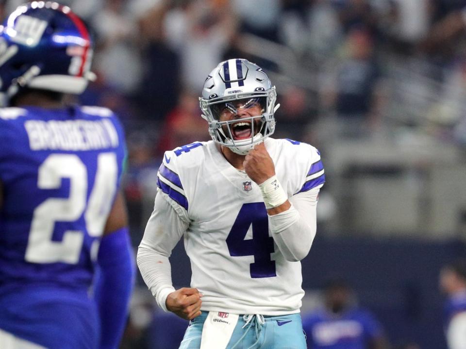 Dak Prescott celebrates a score during the fourth quarter against the New York Giants  (Getty)