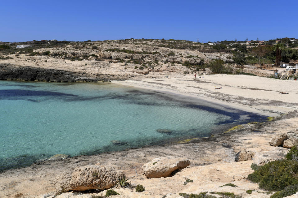 A view of a beach in the Island of Lampedusa, southern Italy, Wednesday, May 12, 2021. Lampedusa is closer to Africa than the Italian mainland, and it has long been the destination of choice for migrant smuggling operations leaving Libya. Over the years, it has witnessed countless numbers of shipwrecks and seen bodies floating offshore, only to be buried in the cemetery on land. (AP Photo/Salvatore Cavalli)