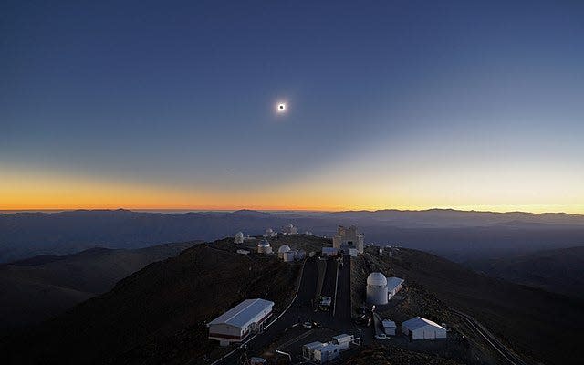 Wide-angle shot of a total solar eclipse over the European Southern Observatory at La Silla, Chile.