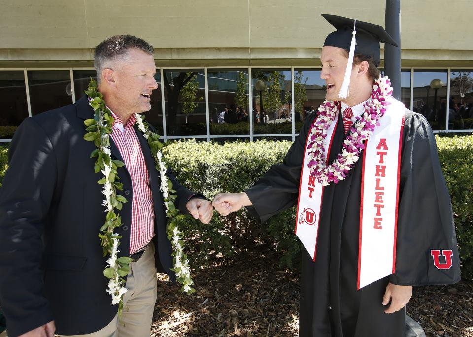 Coach Kyle Whittingham talks with his son Alex as University of Utah football team members gather during University of Utah graduation in Salt Lake City on Friday, May 5, 2017. | Jeffrey D. Allred, Deseret News