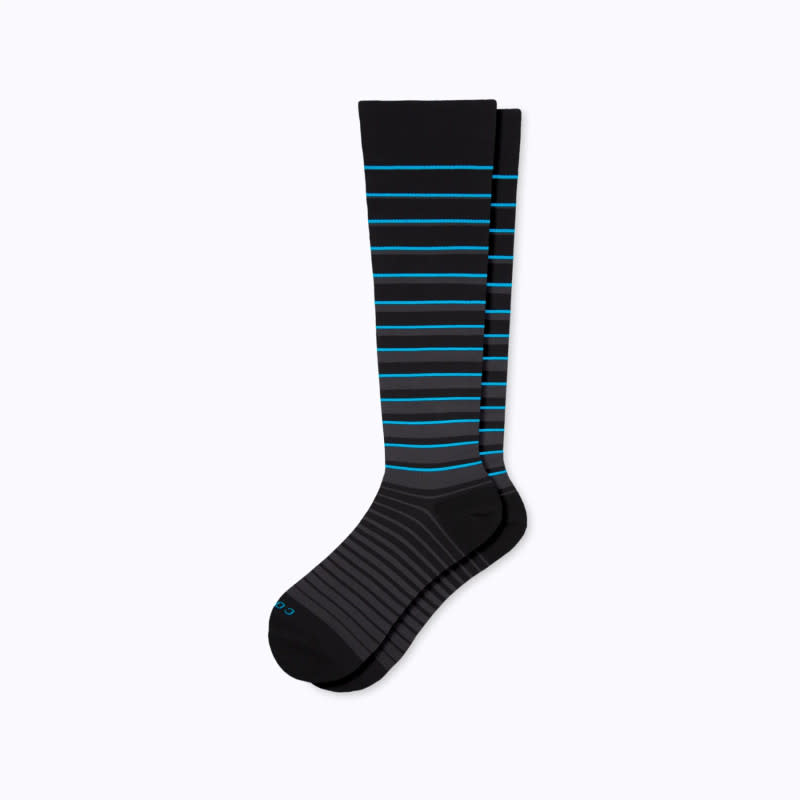 <p>Comrad</p><p>Keep the blood flowing from your knees to your toes, and increase your circulation and speed up recovery time with these knee-high compression socks from Comrad, made to reduce any soreness, fatigue, and swelling that usually follow a long day on your feet. The medium support acts as a massage on your feet, ankles, shin, and calf, and then the material itself improves healing. Infrared-infused fibers absorb your natural body heat and then reflect the energy back into the body to prevent your muscles from cramping up. Wear them while running or after.</p><div><table><thead><tr><th>Pros</th><th>Cons</th></tr></thead><tbody><tr><td><p>Acts as a compression sleeve, speeds up recovery</p></td><td><p><strong> </strong>Niche purpose, sometimes slides down</p></td></tr></tbody></table></div><ul><li><strong>Materials: </strong>36% Emana infrared nylon, 56% nylon, 8% elastane</li><li><strong>Sock Height: </strong>Knee High</li><li><strong>Cushioning: </strong>Medium</li></ul><p>[$38; <a href="https://www.comradsocks.com/products/recovery-knee-high-compression-socks?variant=41077539307554" rel="nofollow noopener" target="_blank" data-ylk="slk:comradsocks.com;elm:context_link;itc:0;sec:content-canvas" class="link ">comradsocks.com</a>]</p>