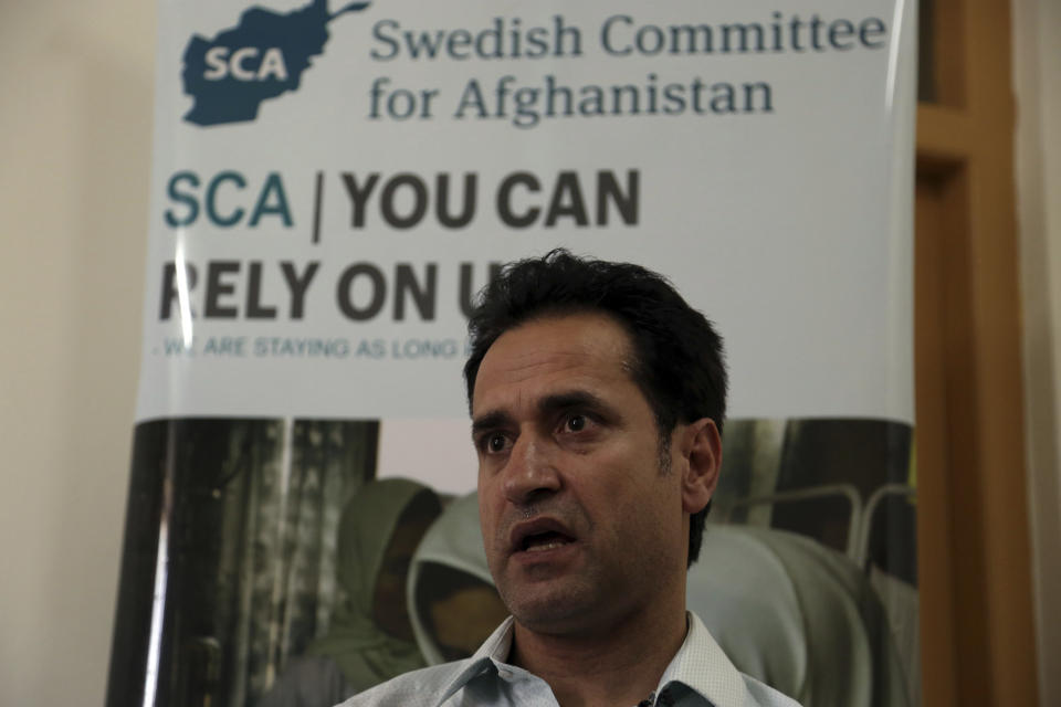 Ahmad Khalid Fahim, program director for the Swedish Committee for Afghanistan speaks during an interview with The Associated Press in Kabul, Afghanistan, Wednesday, July 17, 2019. The Swedish non-governmental organization in Afghanistan said the Taliban have forced the closure of 42 health facilities run by the non-profit group in eastern Maidan Wardan province. (AP Photo/Rahmat Gul)