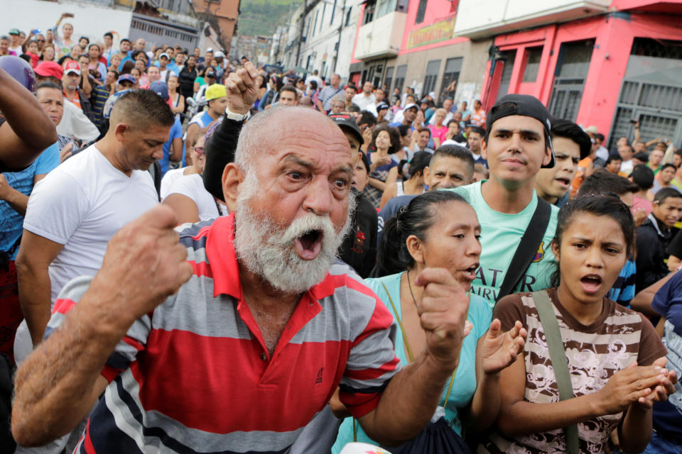 A man shouts during a protest over food shortage and against Venezuela's government in Caracas, Venezuela, on June 14, 2016.&nbsp;