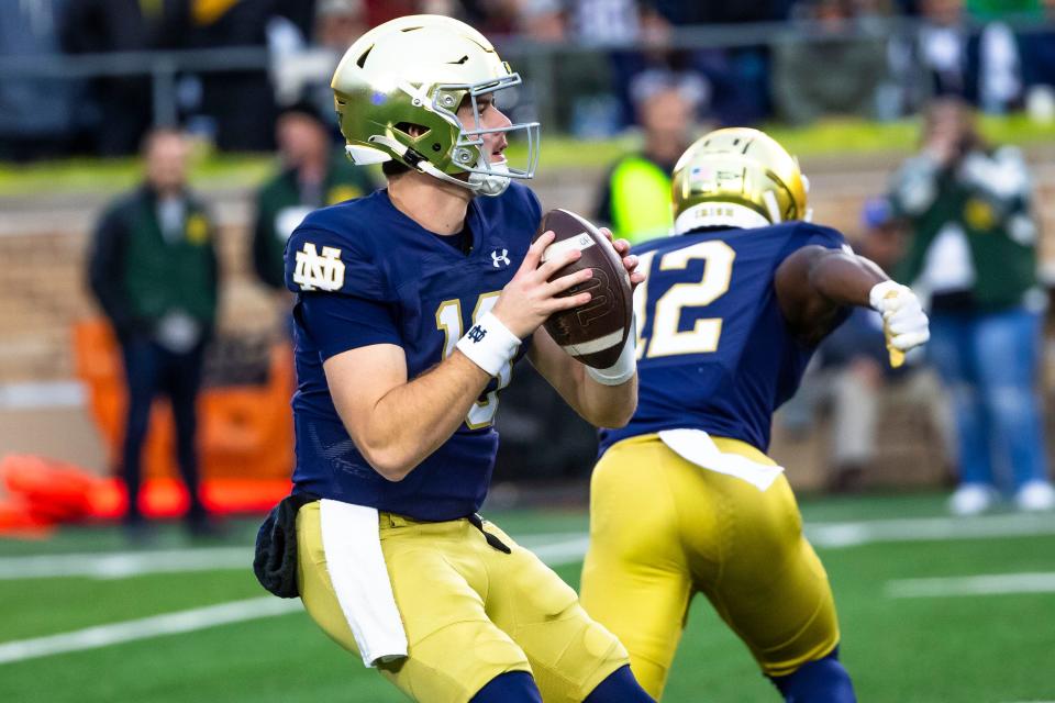 FILE - Notre Dame quarterback Steve Angeli (18) drops back during the second half of an NCAA college football game against Pittsburgh Saturday, Oct. 28, 2023, in South Bend, Ind. The Sun Bowl is matching No. 15 Notre Dame and 21st-ranked Oregon State. (AP Photo/Michael Caterina, File)