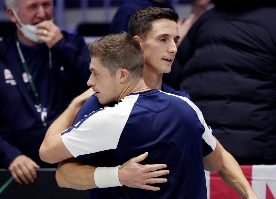 Great Britain's Joe Salisbury, right, and Neal Skupski celebrate after winning against Czech Republic's Tomas Machac and Jiri Vesely during a Davis Cup group C match between Great Britain and Czech Republic in Innsbruck, Sunday, Nov. 28, 2021. (Photo/Michael Probst)