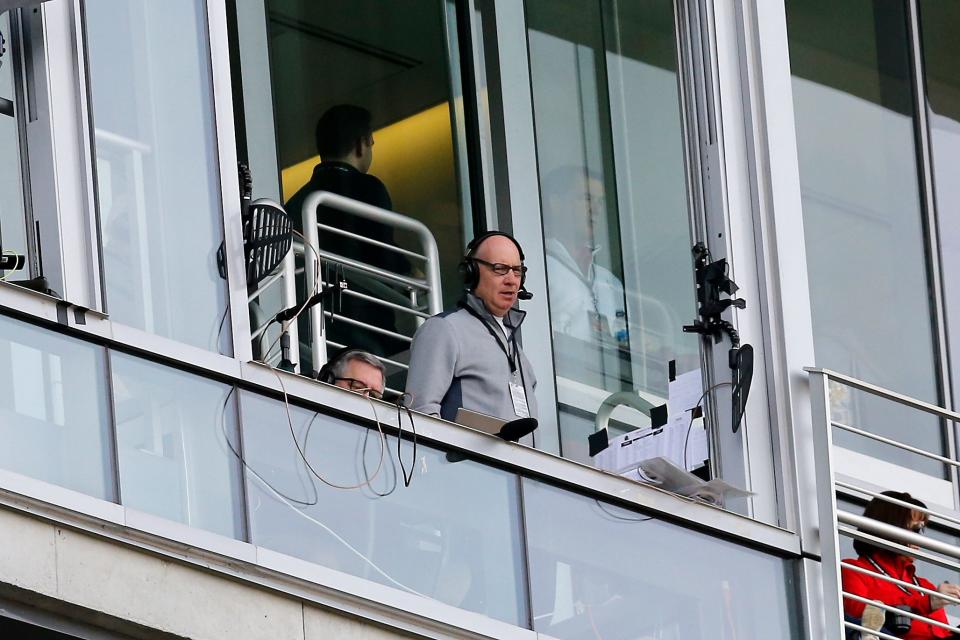 Bearcats Hall of Fame broadcaster Dan Hoard calls the game during the first half of the NCAA American Athletic Conference game between the Cincinnati Bearcats and the Tulsa Golden Hurricane ay Nippert Stadium in Cincinnati on Saturday, Oct. 19, 2019.