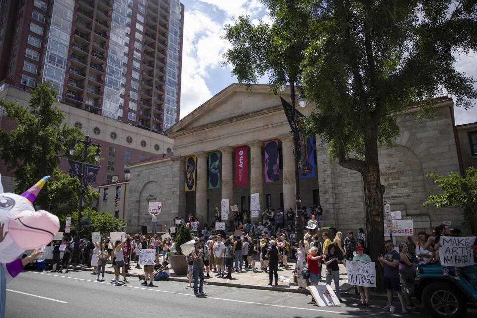 University of the Arts students and supporters gather in protest outside of Hamilton Hall in Philadelphia on Monday, June 3, 2024. The nearly 150-year-old school says it plans to close its doors Friday, June 7. The abrupt decision shocked and angered students, parents and faculty alike and has raised questions about governance at the venerable city institution. (Monica Herndon/The Philadelphia Inquirer via AP)