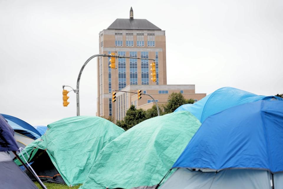 Tents are set up in view of Confederation Building, the seat of government in Newfoundland and Labrador.