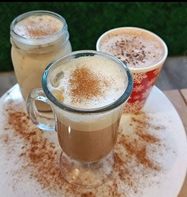 A vanilla pumpkin spice chai latte, a pumpkin spice hot cocoa, and a pumpkin spice caramel latte at Tommy Boy's Cafe in Toms River.