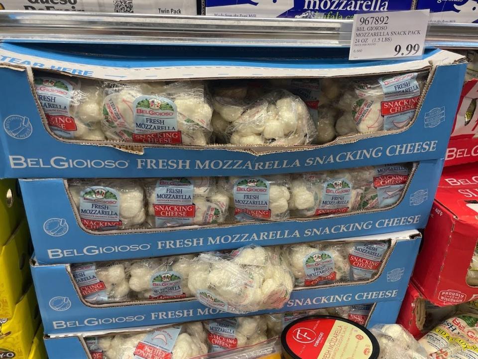 A display of BelGioioso Fresh Mozzarella Snacking Cheese with a price tag that reads $9.99.