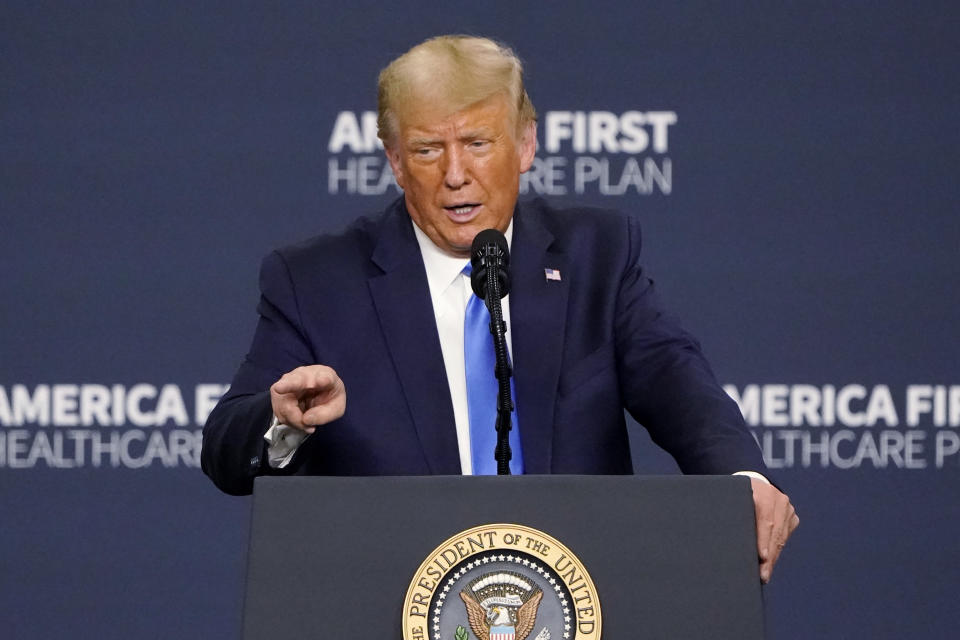 President Donald Trump delivers remarks on healthcare at Charlotte Douglas International Airport, Thursday, Sept. 24, 2020, in Charlotte, N.C. (AP Photo/Chris Carlson)