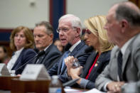 Captain Chesley "Sully" Sullenberger, accompanied by from left, Sharon Pinkerton with Airlines for America, Captain Dan Carey with the Allied Pilots Association, Sara Nelson with the Association of Flight Attendants-CWA, and former Federal Aviation Administration Administrator Randy Babbitt, speaks during a House Committee on Transportation and Infrastructure hearing on the status of the Boeing 737 MAX on Capitol Hill in Washington, Wednesday, June 19, 2019. (AP Photo/Andrew Harnik)