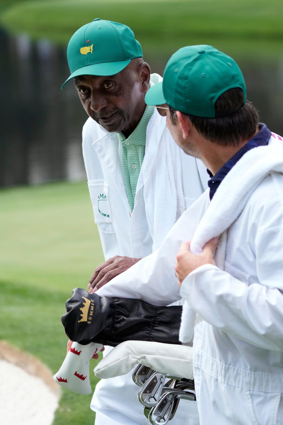 Caddie Carl Jackson looks on Wednesday during the Par 3 Contest at Augusta National for the group including longtime friend and playing partner Ben Crenshaw.