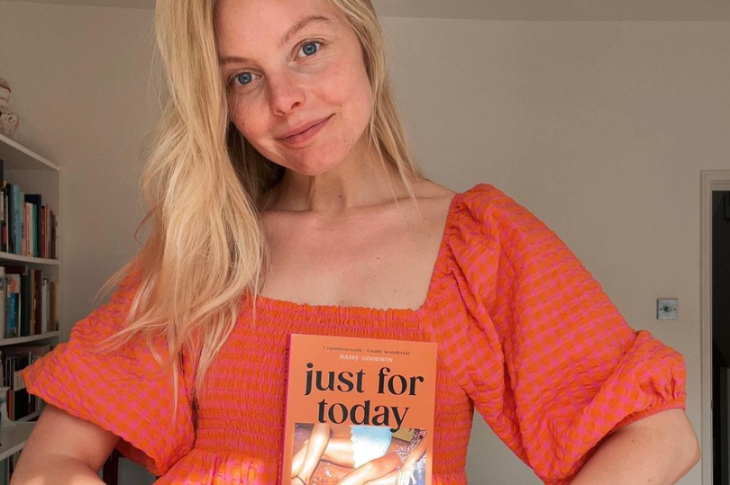 Nell Hudson with her novel, Just For Today -Credit:Instagram/Nell.Hudson