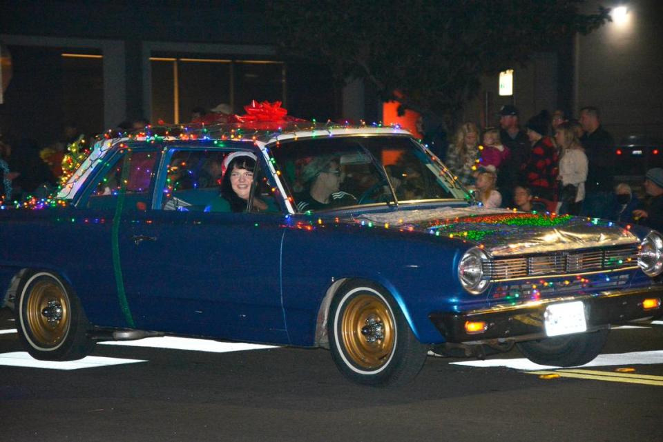 A decorated car drives in the return of Modesto’s Celebration of Lights holiday parade on Dec. 4, 2021 in Modesto, Calif.