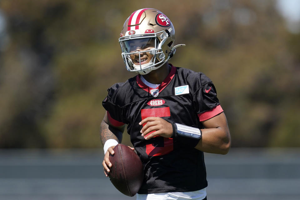 FILE - San Francisco 49ers quarterback Trey Lance takes part in drills at the NFL football team's practice facility in Santa Clara, Calif., Thursday, Sept. 1, 2022. Lance is ready for his first full season as starting quarterback for the San Francisco 49ers despite getting almost no game action the past two seasons and with former starter Jimmy Garoppolo back on the bench behind him. (AP Photo/Jeff Chiu, File)