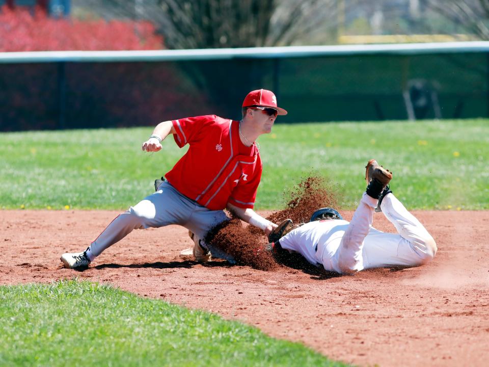 A.J. Winders, of Sheridan, tags out Brady Andrews at second base during a 14-4, 15-5 sweep of host Fairfield Union on Saturday in Rushville. The Generals, who hit three homers, improved to 7-0.