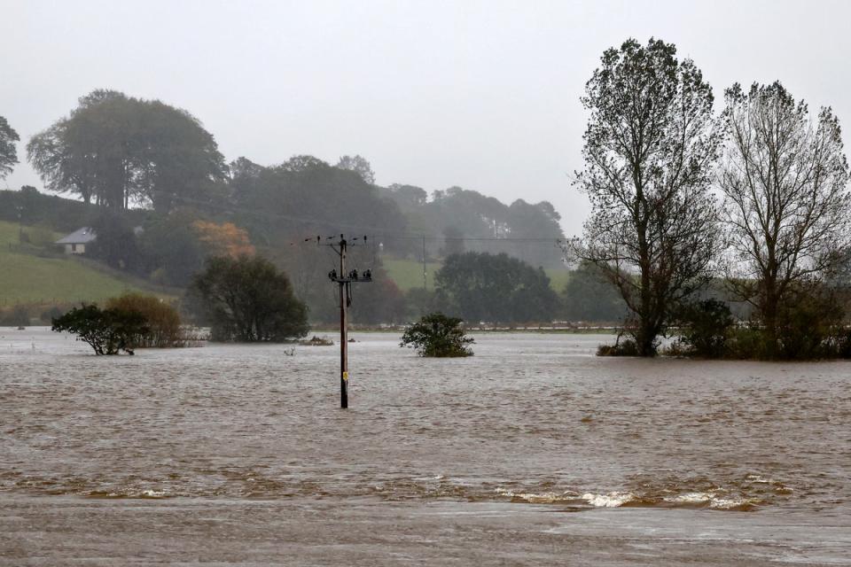Several flood warnings were issued along the length of the River Don as heavy rain continues in Kintore, Scotland (Getty Images)