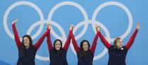 2016 Rio Olympics - Swimming - Victory Ceremony - Women's 4 x 200m Freestyle Relay Victory Ceremony - Olympic Aquatics Stadium - Rio de Janeiro, Brazil - 10/08/2016. Allison Schmitt (USA) of USA, Leah Smith (USA) of USA, Maya DiRado (USA) of USA and Katie Ledecky (USA) of USA celebrate winning the gold. REUTERS/Marcos Brindicci