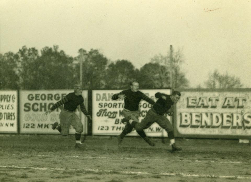 Canton has a strong connection to the birth of the National Football League. Meetings to form the league that evolved into the NFL took place in Canton and one of the initial teams was the Canton Bulldogs. Individuals involved in forming the league met for food and drinks at Bender's Tavern, whose advertisement at the Bulldogs game pictured here is evident. The first game in the league's schedule was played in Dayton, a sports event celebrated in the new film "Triangle Park," written and directed by Allen Farst.