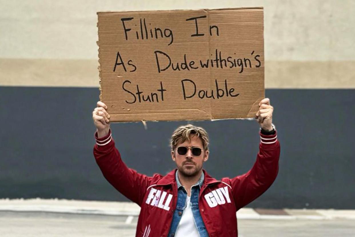 <p>Dude with Sign/Instagram</p> Ryan Gosling