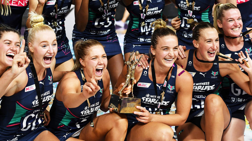 The Vixens are celebrate with the trophy after winning the 2020 Super Netball Grand Final.