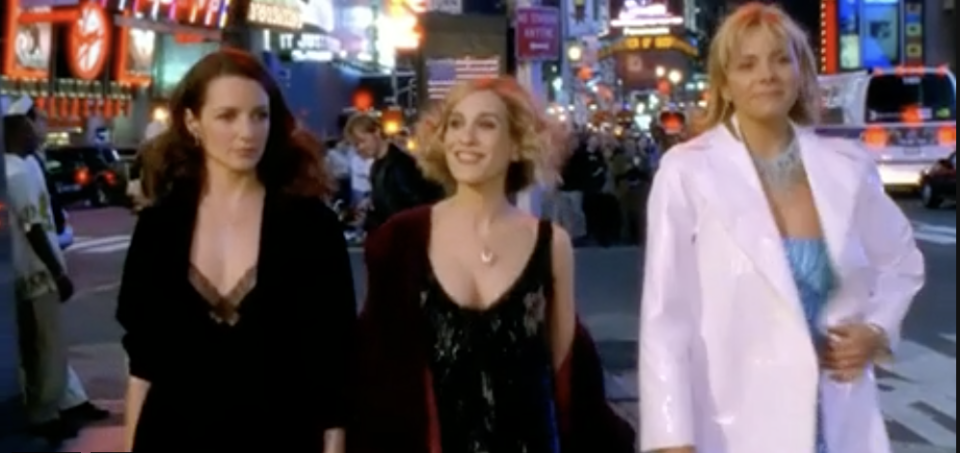 the cast of "sex and the city" walking in times square