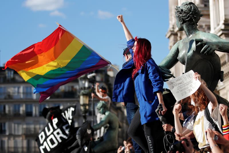 Feminist activists demonstrate against new government appointments in Paris