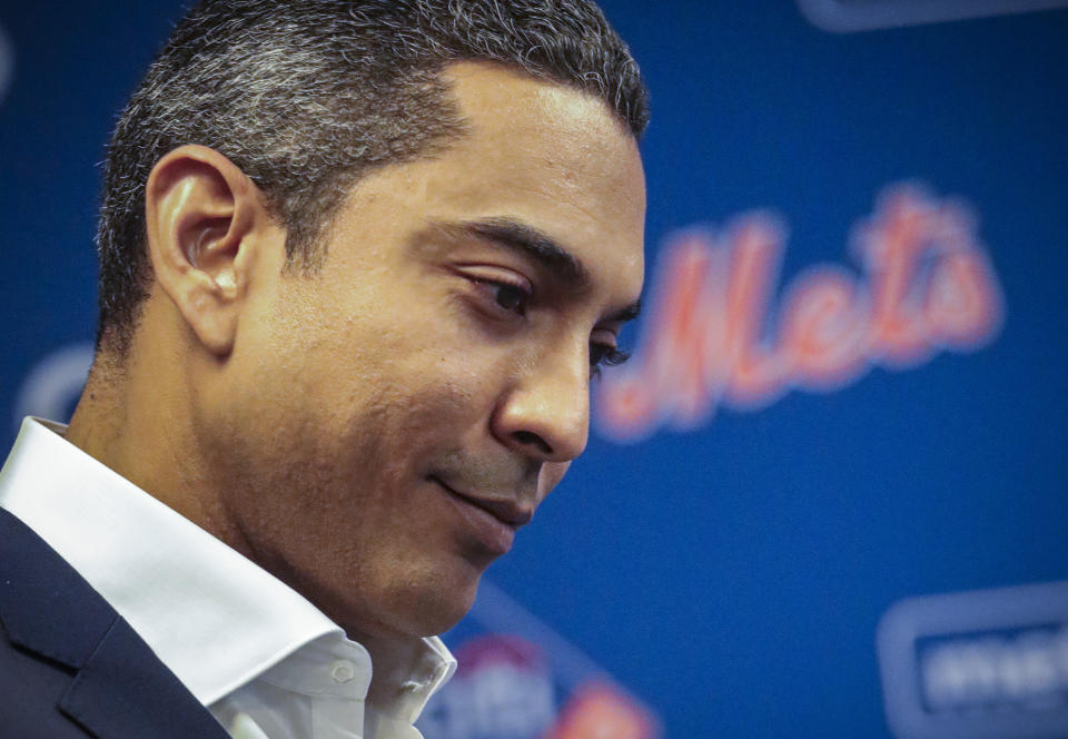 Luis Rojas listens as he is introduced as the New York Mets new manager, Friday, Jan. 24, 2020, during a news conference in New York. (AP Photo/Bebeto Matthews)