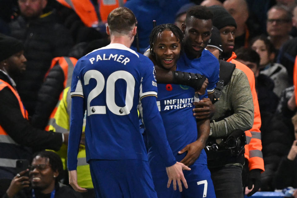 Chelsea's English midfielder #07 Raheem Sterling (C) celebrates with teammates after scoring their second goal during the English Premier League football match between Chelsea and Manchester City