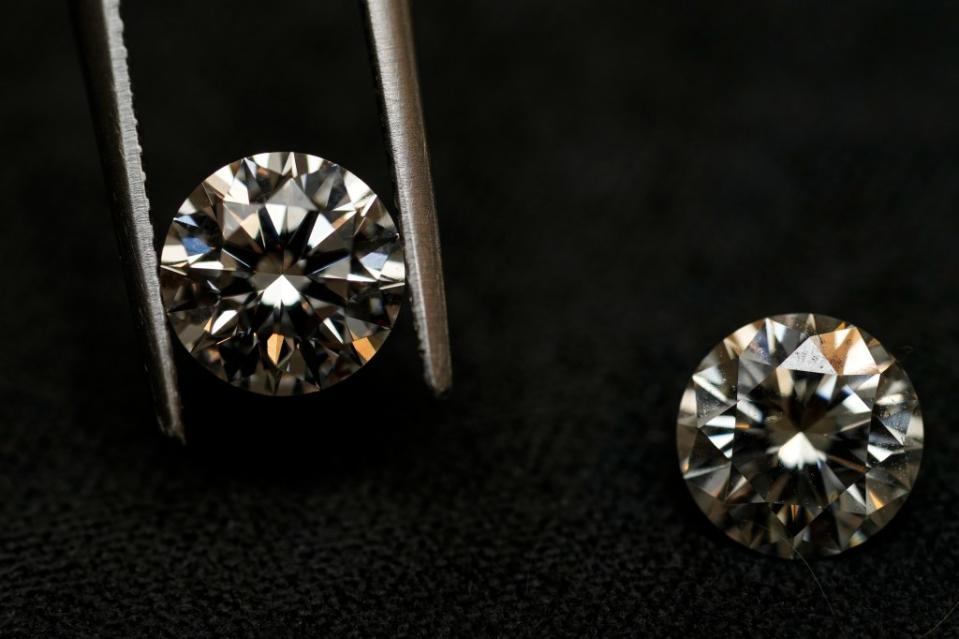 Lab grown diamonds, left, have been in high demand due to their lower price point compared to their natural counterpart, right. AP