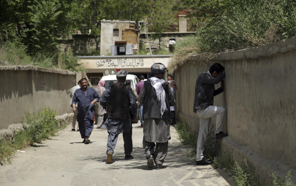 <p>Relatives of victims, who were killed in the second bombing, react in Kabul, Afghanistan, April 30, 2018. (Photo: Massoud Hossaini/AP) </p>