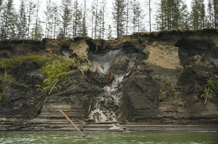<span class="caption">Permafrost and ice wedges have built up over millennia in the Arctic. When they thaw, they destabilize the surrounding landscape.</span> <span class="attribution">Michael Robinson Chavez/The Washington Post via Getty Images</span>