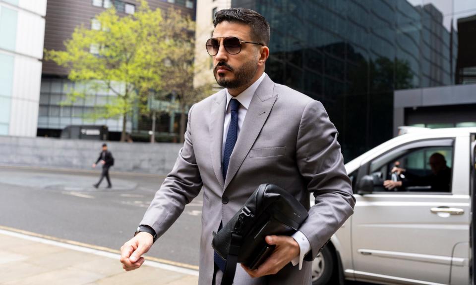 <span>Saif Alrubie arriving at Southwark crown court in London, where he is charged with sending Marina Granovskaia an electronic communication with intent to cause distress or anxiety.</span><span>Photograph: Jordan Pettitt/PA</span>