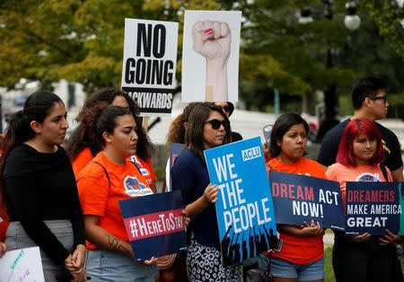 Immigration activists and DACA recipients take part in a rally about the importance of passing a clean DREAM Act before delivering a million signatures to Congress on Capitol Hill in Washington, U.S., September 12, 2017. REUTERS/Joshua Roberts