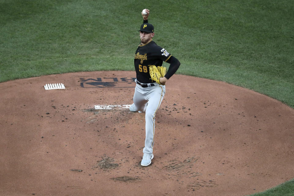 Pittsburgh Pirates starting pitcher Joe Musgrove throws during the first inning of a baseball game against the St. Louis Cardinals Friday, July 24, 2020, in St. Louis. (AP Photo/Jeff Roberson)