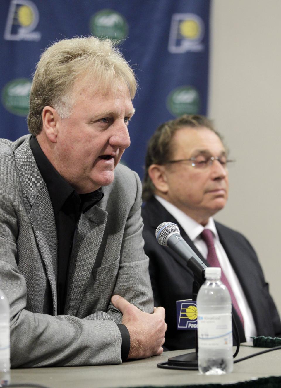 Larry Bird, left, talks about stepping down as president of the Indiana Pacers as team owner Herb Simon listens during an announcement by the NBA basketball team in Indianapolis, Wednesday, June 27, 2012. Donnie Walsh was named as president and Kevin Pritchard as general manager. (AP Photo/Michael Conroy)