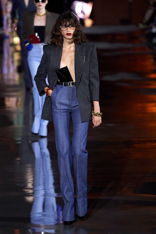 <p><strong>Saint Laurent:</strong> "We love to see the return to tailoring and that strong-shouldered blazer after so many months of being at home and casual. And the high-waisted flare jean: This perfectly tailored pair is lengthening and very flattering. Just add platforms. Full stop."</p><p>Photo: Imaxtree</p>