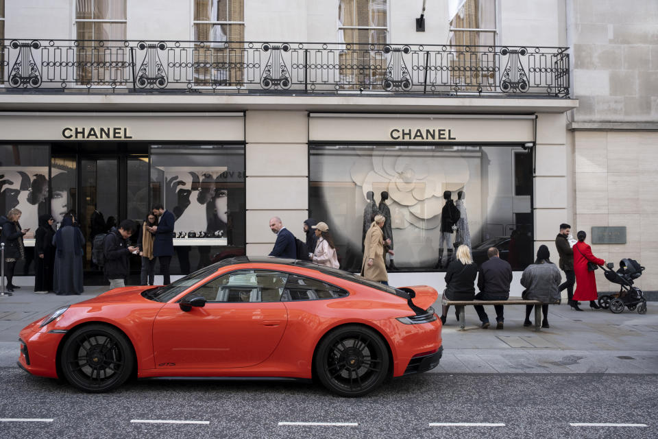 High end Porsche 911 Carrrera GTS car parked outside the Chanel store on Bond Street on 16th October 2023 in London, United Kingdom. Bond Street is one of the principal streets in the West End shopping district and is very upmarket. It has been a fashionable shopping street since the 18th century. The rich and wealthy shop here mostly for high end fashion and jewellery. (photo by Mike Kemp/In Pictures via Getty Images)