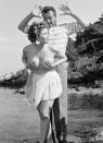 9. In 1954 a lesser-known B-movie actress named Simone Silva was named “Miss Festival 1954” and instead of playing the demure ingenue during her photo shoot to celebrate her honorary title, Silva surprised everyone by taking off her top and posed topless (with hands strategically placed over her breasts) with actor Robert Mitchum.