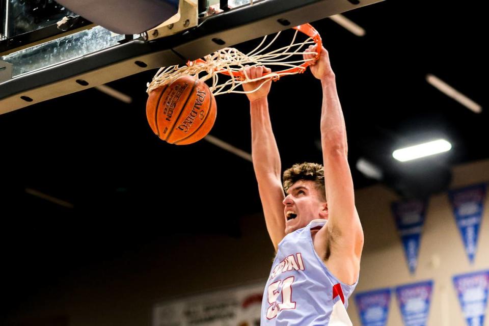 Lapwai guard Kase Wynott broke Idaho’s career high school basketball scoring record Thursday. He’s scored 2,613 points so far with four regular-season games and the postseason to come. Above, he dunks the ball against Lewiston last season.