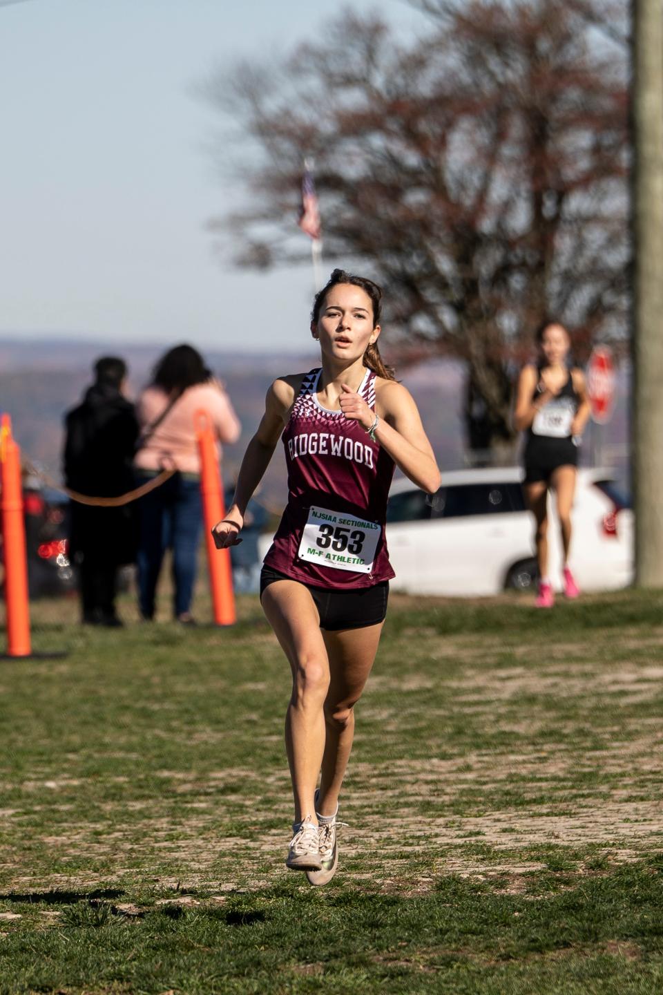 The State Sectional Cross-Country championships are held in Woodland Park, NJ on Saturday October 29, 2022. Cellina Rabolli with Ridgewood High School comes in third in the group four girls race.