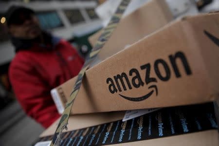 Amazon boxes are seen stacked for delivery in the Manhattan borough of New York City, January 29, 2016. REUTERS/Mike Segar