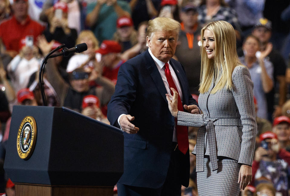 President Donald Trump greets his daughter Ivanka Trump as she arrives to speak during a rally at the IX Center, in Cleveland.